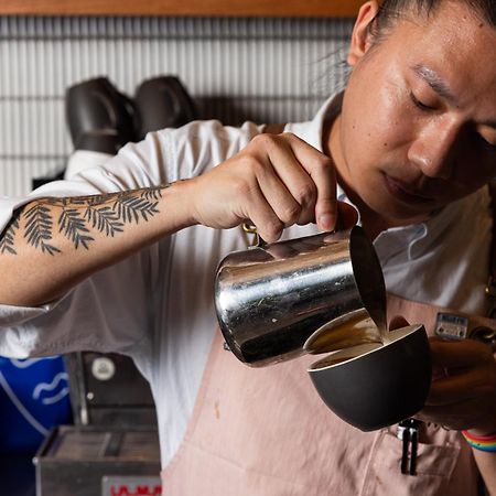 Crystalbrook Vincent Hotel Brisbane Bagian luar foto A barista making a latte